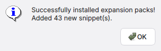 FlitKey confirmation dialog showing that expansion packs were installed successfully